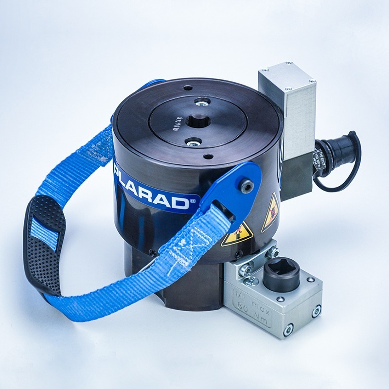This showes a black hydraulic tensioner against the white background.