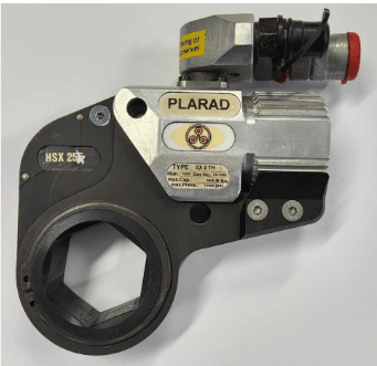 A metallic hydraulic torque wrench from Plarad, features various markings and a rotating head attachment.