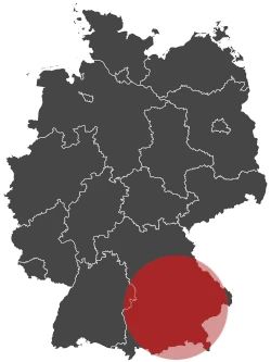 Map of Germany highlighting the southeastern region in red, showcasing Plarad Kontakte für Deutschland rund um die Uhr.